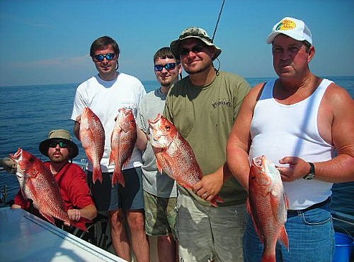 Deep Sea Fishing on a calm day with family in Gulf Shores