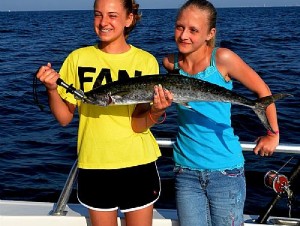 Charter Boat in Orange Beach Trolling Fishing for King Mackerel with Kids