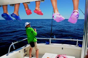 family fishing in orange beach