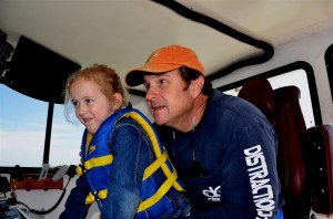 Kids driving the fishing charter boat